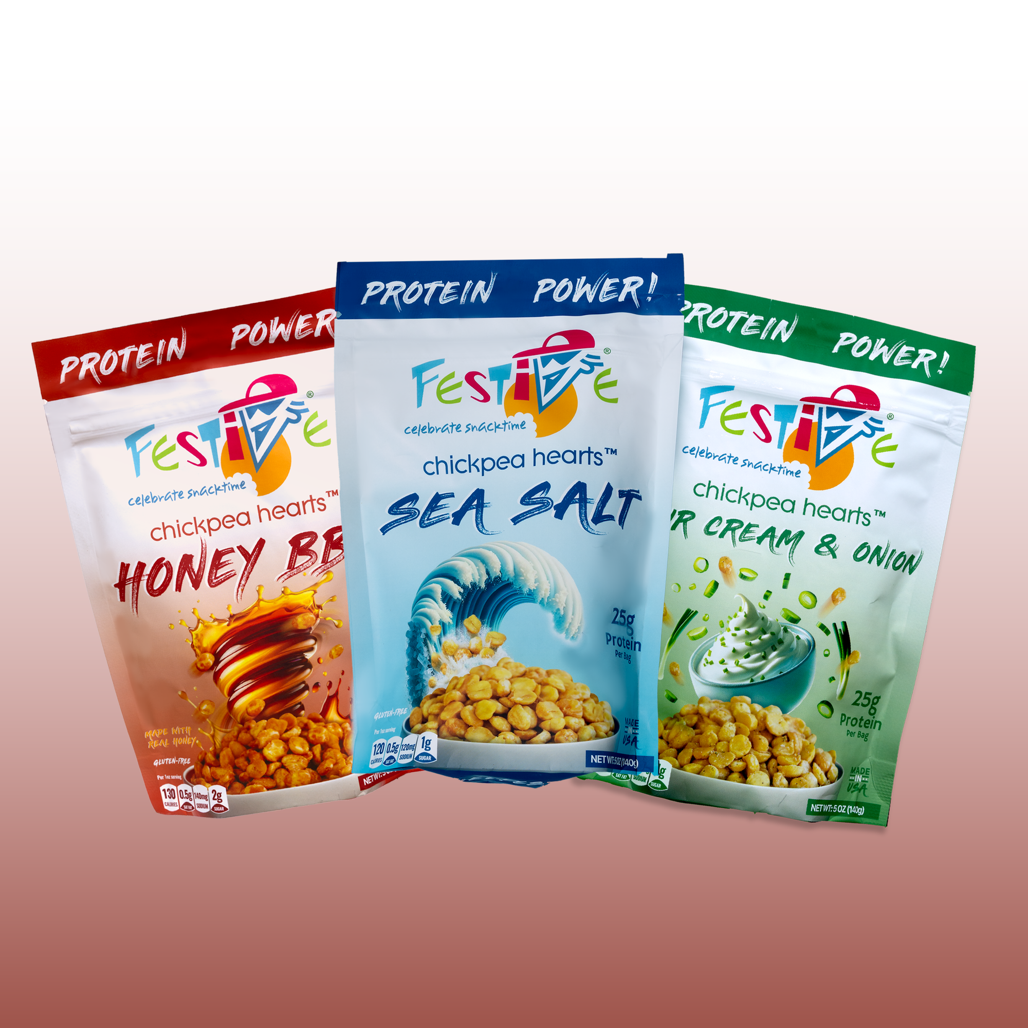 Three packages of Festive chickpea hearts with different flavors on a gradient background