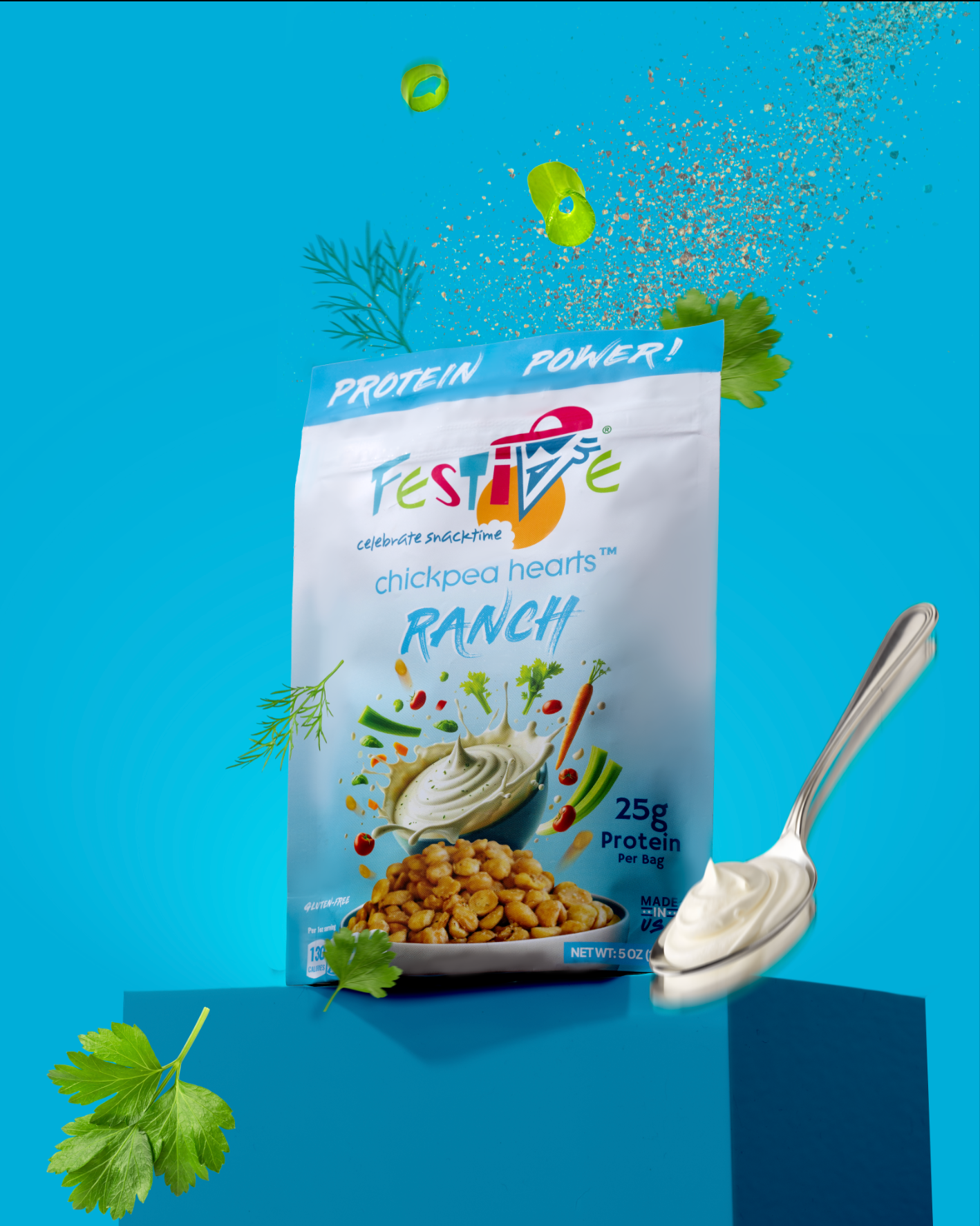 Festive chickpea hearts ranch package with a spoonful of ranch dressing on a blue background