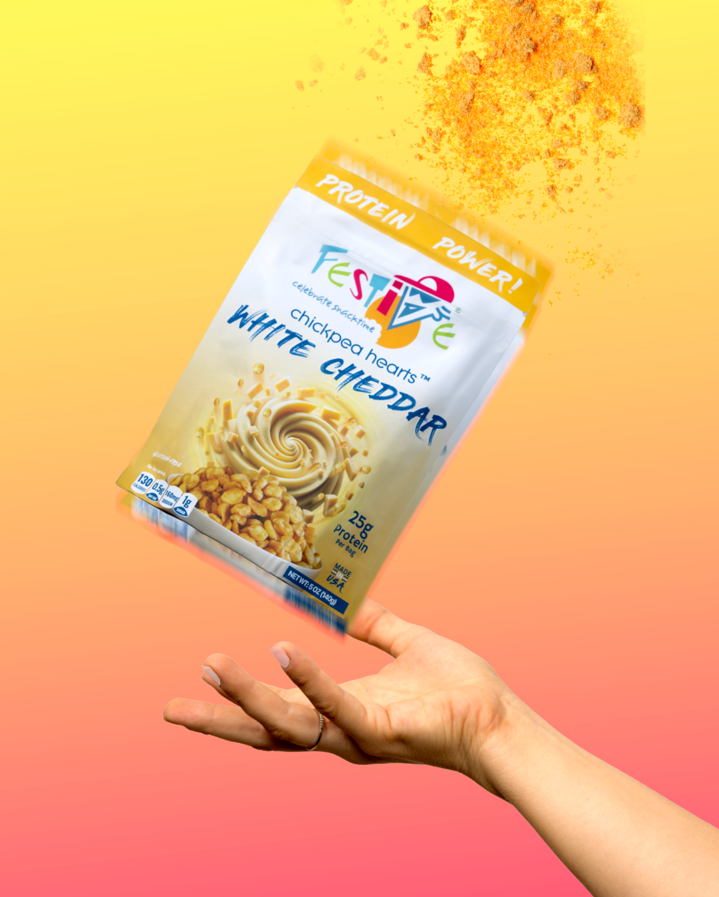 Hand holding a package of Protein Power! White Cheddar flavored chickpeas snack against a gradient background